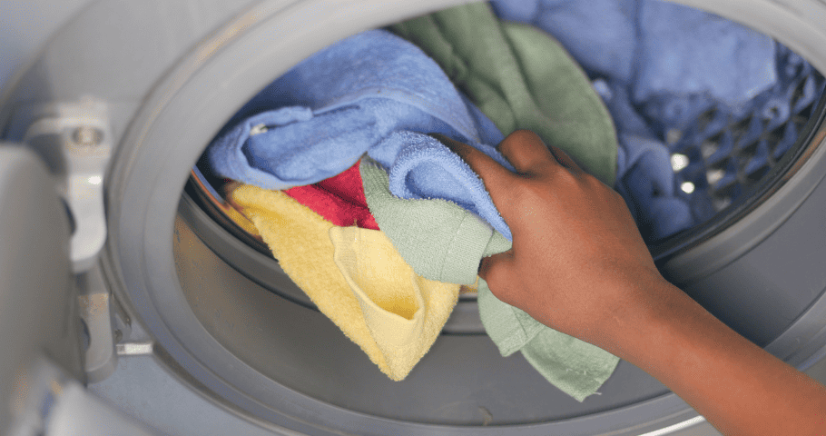 Adding a cup of vinegar to the washer for the last rinse cycle will eliminate most smells.  
